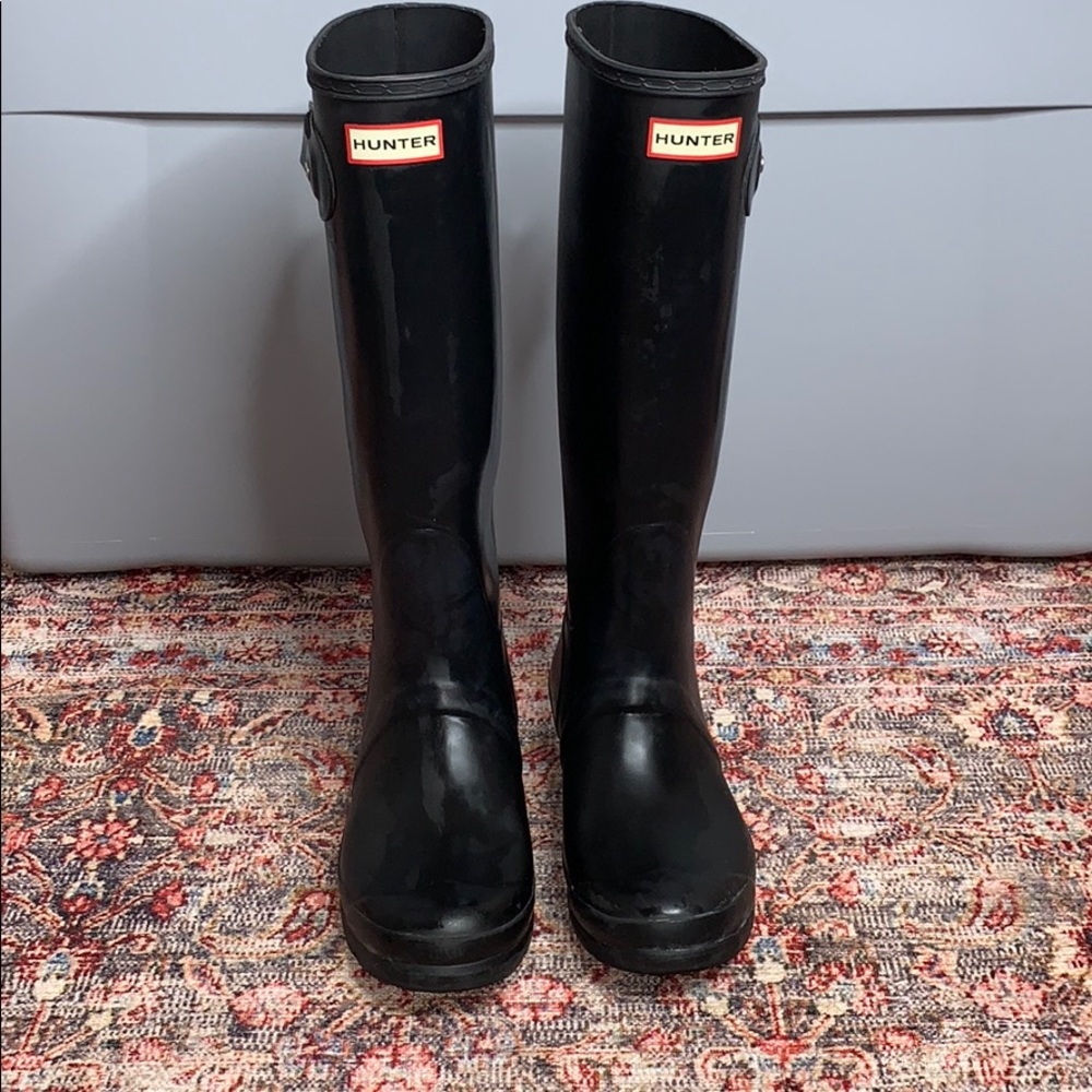 Tall black Hunter rain boots